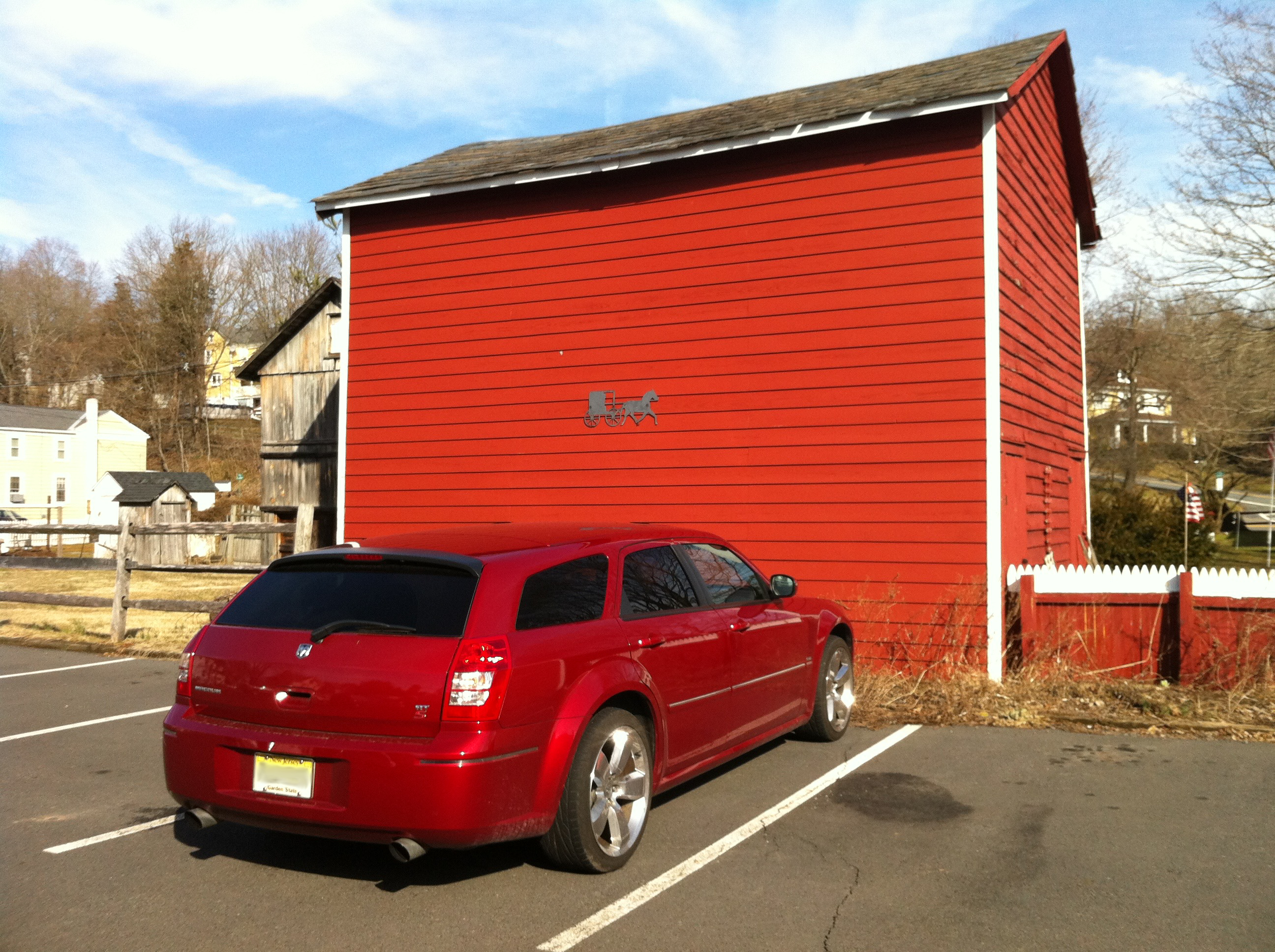 red car red barn